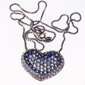 A CONTEMPORARY DIAMOND AND SAPPHIRE SET PENDANT