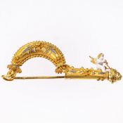 AN ANTIQUE ENAMEL FIBULA