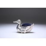 AN EDWARDIAN SILVER NOVELTY PIN CUSHION, IN THE FORM OF A DUCK