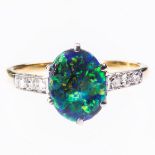 A BLACK OPAL AND DIAMOND RING