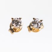 A PAIR OF DIAMOND EARRINGS