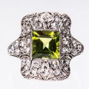 A LATE 19TH CENTURY PERIDOT AND DIAMOND RING