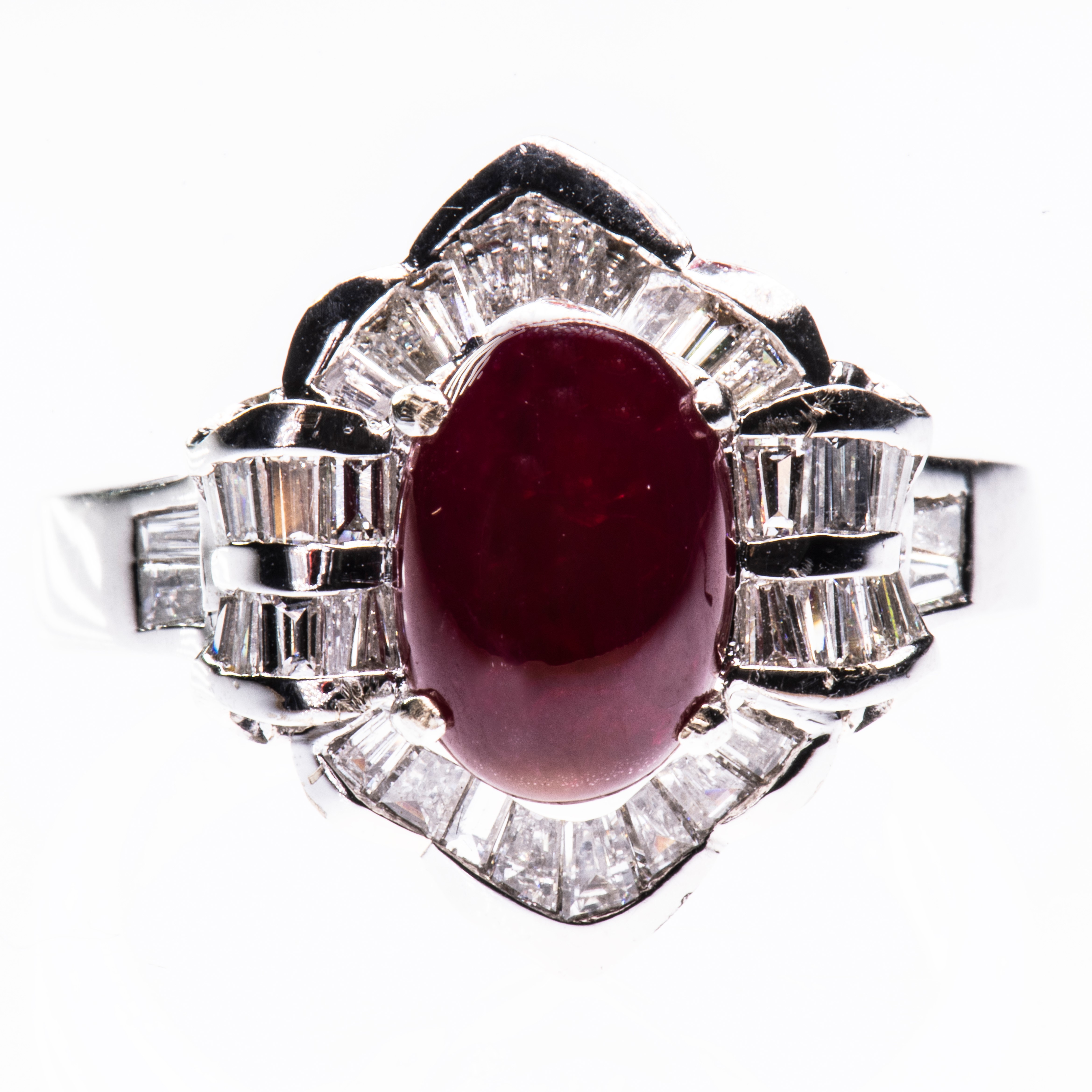 AN 18CT WHITE GOLD, RUBY AND DIAMOND RING