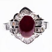 AN 18CT WHITE GOLD, RUBY AND DIAMOND RING