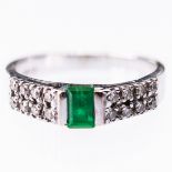 AN 18CT WHITE GOLD EMERALD AND DIAMOND RING