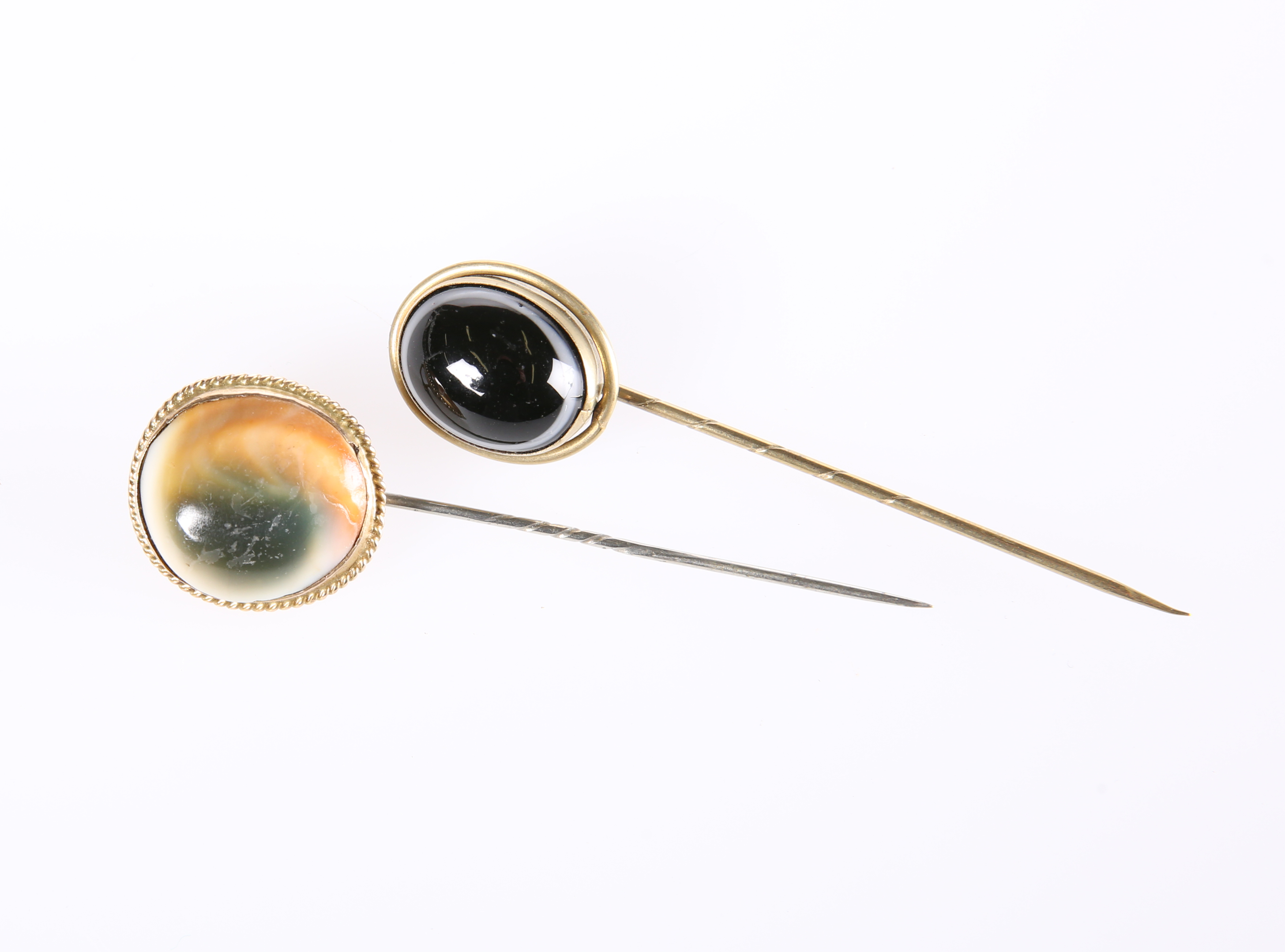 TWO TIGER'S EYE STICK PINS, LATE 19th CENTURY