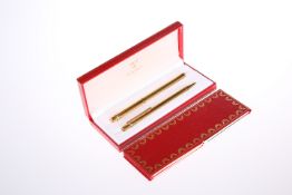 MUST DE CARTIER, A CASED SET OF FOUNTAIN PEN AND PROPELLING PENCIL