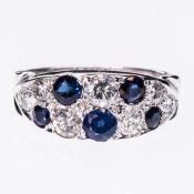 A SAPPHIRE AND DIAMOND RING