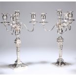 A HANDSOME PAIR OF VICTORIAN FOUR-LIGHT SILVER CANDELABRA IN THE ADAM REVIVAL TASTE