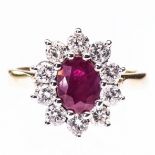 AN 18CT YELLOW GOLD, RUBY AND DIAMOND CLUSTER RING