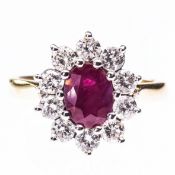 AN 18CT YELLOW GOLD, RUBY AND DIAMOND CLUSTER RING