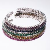 FIVE 18CT WHITE GOLD AND GEM SET BANGLES BY KESSARIS