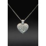 A CONTEMPORARY 18CT WHITE GOLD AND DIAMOND SET HEART PENDANT
