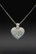A CONTEMPORARY 18CT WHITE GOLD AND DIAMOND SET HEART PENDANT