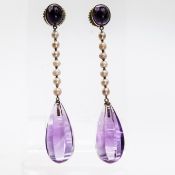 A PAIR OF AMETHYST AND SEED PEARL EARRINGS