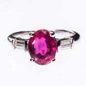 AN 18CT WHITE GOLD RUBY AND DIAMOND RING