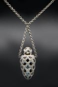 AN 18CT WHITE GOLD AND DIAMOND SET SCENT FLASK NECKLACE BY THEO FENNELL