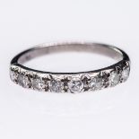 AN 18CT WHITE GOLD AND DIAMOND RING