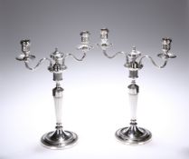 A PAIR OF GEORGE III SILVER TWO-LIGHT CANDELABRA, JOHN WINTER & CO., SHEFFIELD 1780