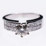 AN 18CT WHITE GOLD AND DIAMOND RING