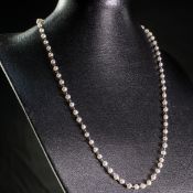 A SEED PEARL AND PLATINUM NECKLACE CHAIN