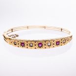 A MID 19TH CENTURY RUBY AND DIAMOND SET BANGLE