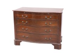 A GEORGE III STYLE MAHOGANY SERPENTINE CHEST OF DRAWERS