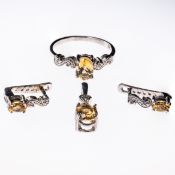 A 9CT WHITE GOLD AND CITRINE RING