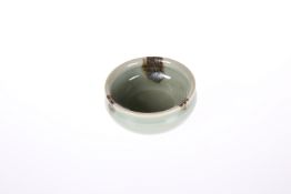 A SMALL CHINESE CELADON GLAZED BOWL