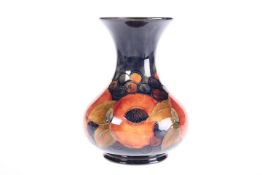 A WALTER MOORCROFT POTTERY VASE