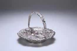 AN EARLY VICTORIAN SILVER SWING HANDLED "CASTLE" BASKET