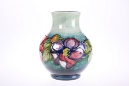 A WALTER MOORCROFT POTTERY VASE