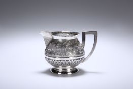 AN INDIAN SILVER CREAM JUG, c. 1900