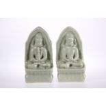 A PAIR OF CHINESE CELADON BUDDHAS