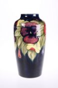 A WALTER MOORCROFT POTTERY VASE