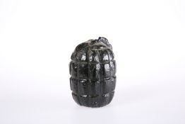 A BLACK PAINTED MILLS GRENADE