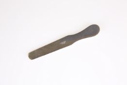 A WHITE METAL TONGUE DEPRESSOR, SECOND QUARTER 19th CENTURY