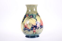 A WALTER MOORCROFT POTTERY VASE