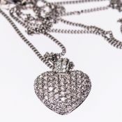 A CONTEMPORARY 18CT WHITE GOLD AND DIAMOND SET HEART PENDANT