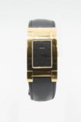 A GENTS GOLD PLATED VERSACE STRAP WATCH