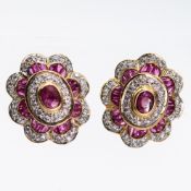 A PAIR OF RUBY AND DIAMOND CLUSTER EARRINGS