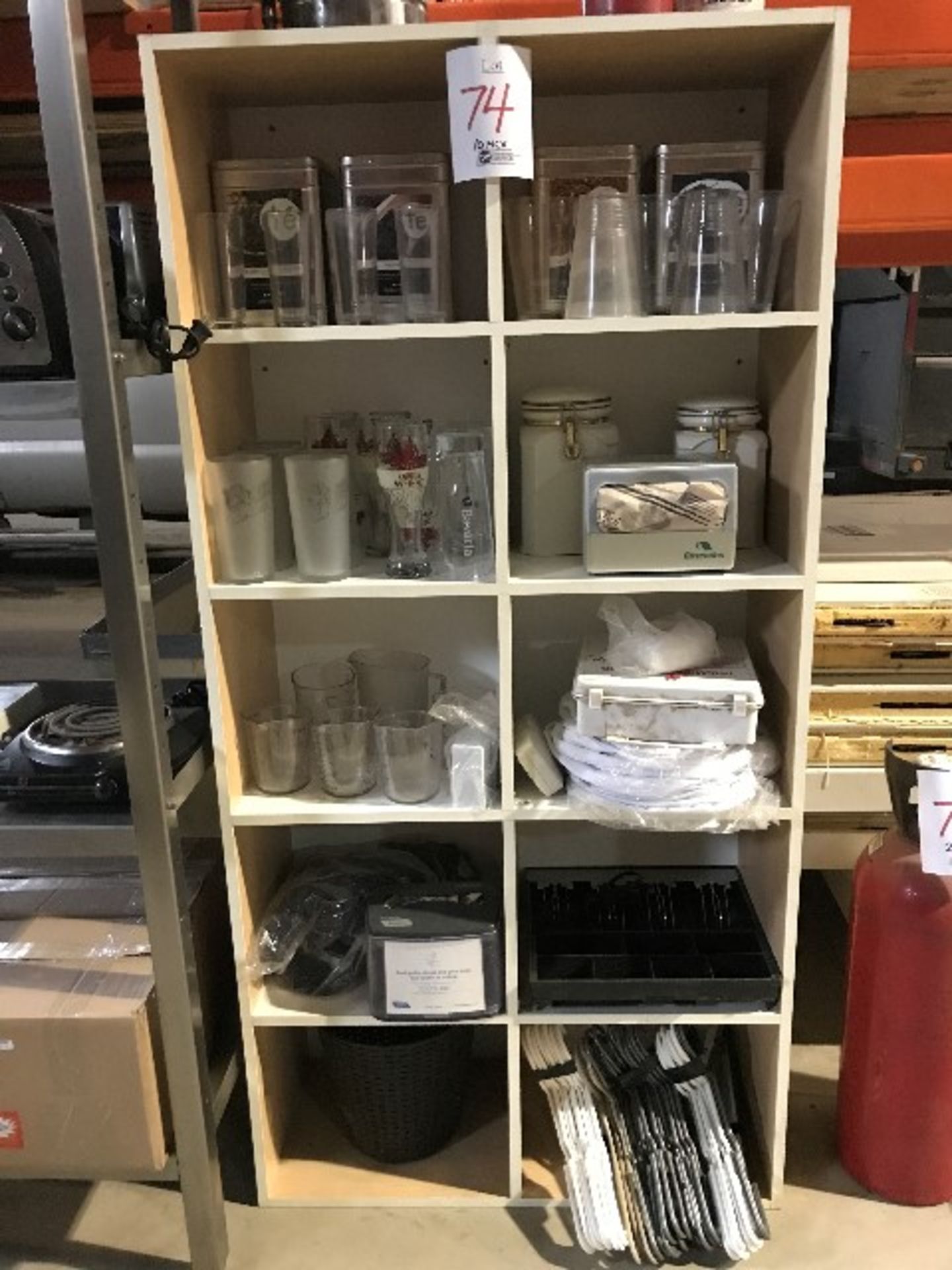 LOT: Assorted merchandise w/stand,10 cubicles