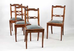 Vier Stühle19. und Anfang 20. Jh.. Nussbaum massiv und furniert, ein Stuhl Buche. Drei Stuhlsitze