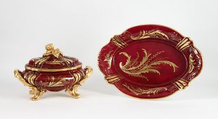 Deckelschüssel auf ovaler PlatteFrankreich, Limoges, Manufakturstempel. Ovale, bauchige Schüssel,