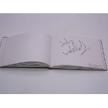 Autograph: An autograph album - numbered 203 containing circa 95 signatures collected in person by