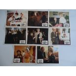 ESKIMO NELL (1975) First Release - Complete set of 8 x British Front of House Lobby Cards (10" x