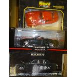 A GROUP OF LARGE SCALE MODEL CARS by BBURAGO and MINICHAMPS as lotted - VG/E in F/G boxes - (3)