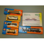 HO GAUGE: AN ASSORTMENT OF WAGONS BY TRIX, ROCO AND HERKAT AS LOTTED - G/VG IN G/VG BOXES (6)