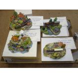 A TRAY CONTAINING FOUR COUNTRY LINES COLLECTION CAST RESIN STATIC RAILWAY SCENES by DANBURY MINT