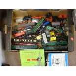 OO GAUGE: A LARGE TRAY OF ASSORTED ROLLING STOCK FOR SPARES/REPAIR TOGETHER WITH A BOOK AND